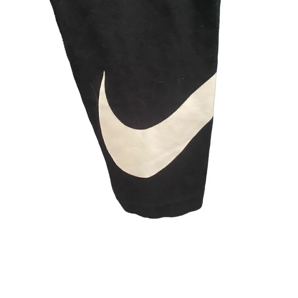 Nike girls, black elastic waist logo leggings, size large